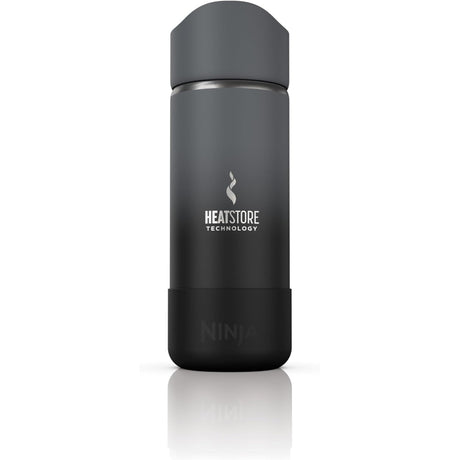 Imagen de la taza de viaje Ninja Sip Perfect 16 oz en acero inoxidable, con tecnología HeatStore™ que mantiene y regula la temperatura de las bebidas. Incluye tapa antifugas y diseño portátil para disfrutar café o té caliente en cualquier lugar.